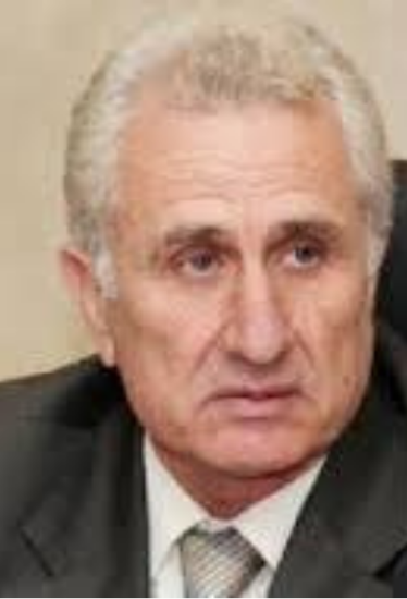 H.E. Prof. Wajih Owais.png